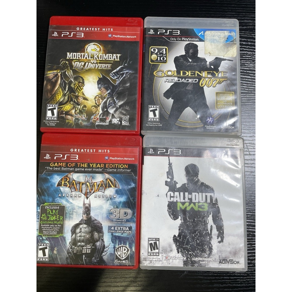 PS3 Game Lot of 4 GoldenEye Reloaded Batman Arkham Asylum MK vs DC MW3